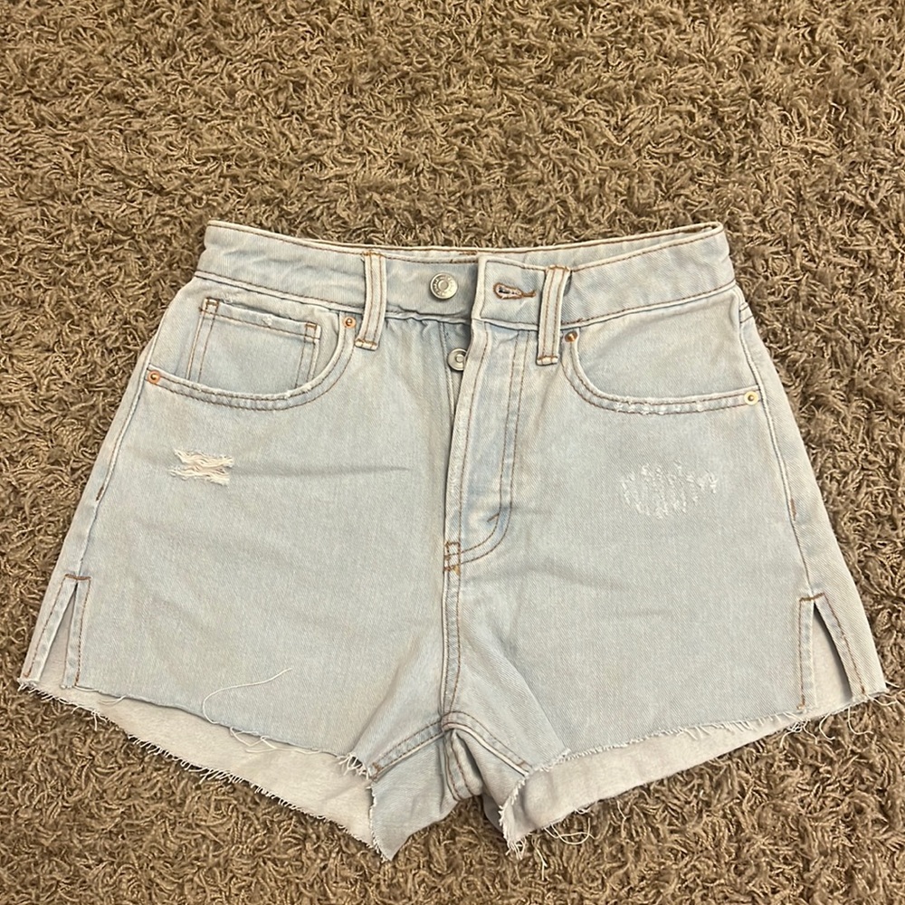 light wash, frayed shorts